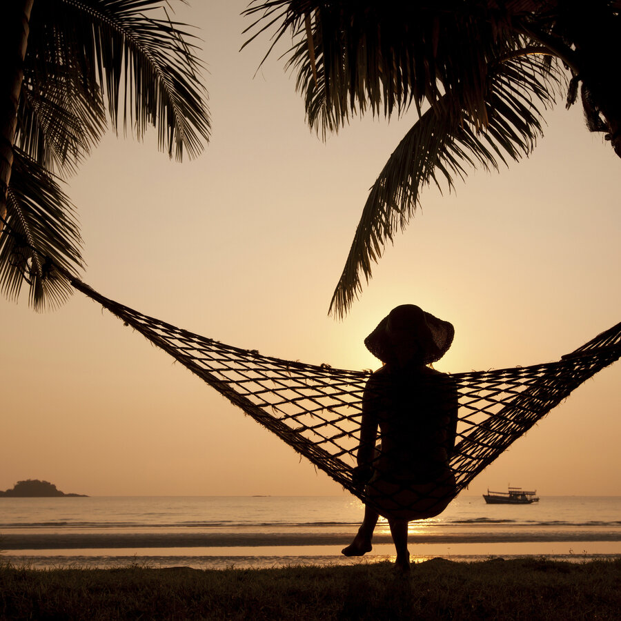 Person on a hammock on the beach